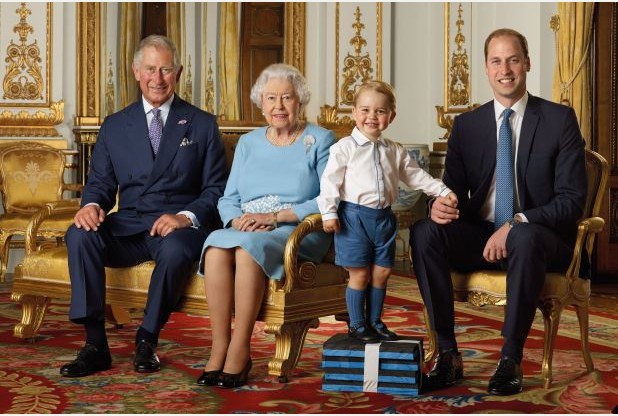 No use after 31 May 2016. Prince George stands on foam blocks during a Royal Mail photoshoot for a stamp sheet to mark the 90th birthday of Queen Elizabeth II. The sheet features four generations of the Royal family, from left, the Prince of Wales, Queen Elizabeth II, Prince George and the Duke of Cambridge, and the picture was taken in the summer of 2015 in the White Drawing Room at Buckingham Palace. PRESS ASSOCIATION Photo. Issue date: Wednesday April 20, 2016. See PA story ROYAL Stamps. Photo credit should read: Ranald Mackechnie/Royal Mail/PA Wire
